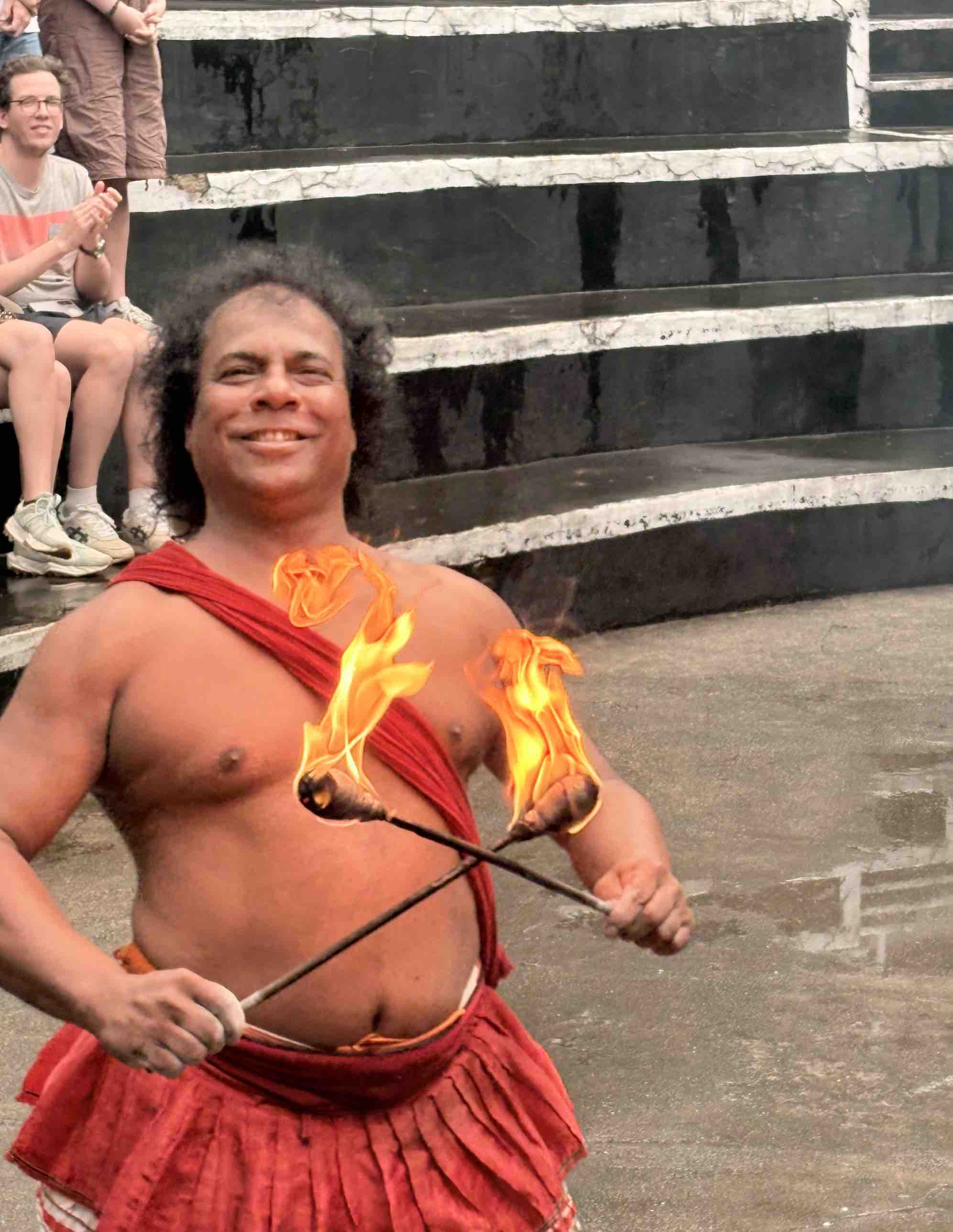 Fire eater performing at the outdoor finale of the Kandy Cultural Show